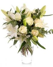 Bouquet of white roses, lilies and Chrysanthemums Bouquet of white roses, lilies and Chrysanthemums